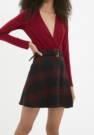 Falda acampanada - red