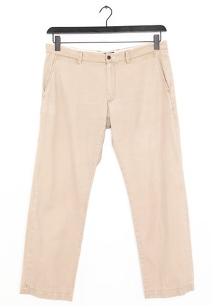 Beige cotton trousers with a straight-leg design, featuring two side pockets, a front button closure, and stitching detail at the hem.