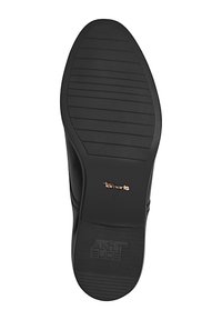 Suela de zapato negra con un patrón texturizado y estriado para mayor agarre; presenta el texto en relieve "ANTI SLIDE" y el logotipo de la marca. Tamaño indicado como 37.