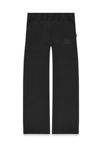Black jogger pants with a relaxed fit, elastic waistband, two side pockets, and a subtle logo print on the left thigh. Soft cotton material.