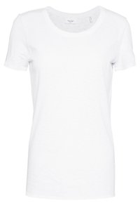 Camiseta blanca de algodón con cuello redondo y mangas cortas. La tela parece suave, con un acabado liso y un detalle de costura mínimo.