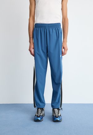IN GAME TRACK PANT - Tréningruha alsók - blue