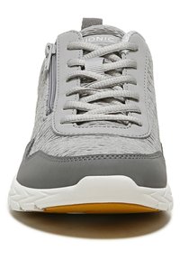 Gray athletic shoes with a textured fabric upper, white and gray rubber sole, and lace-up design featuring a side zipper for easy access.