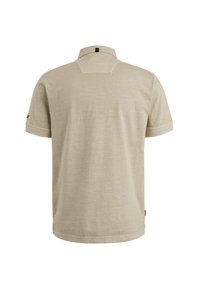 T-shirt polo beige à manches courtes, col classique, détail au dos, et finitions contrastantes sur les manches. Tissu doux et coupe décontractée.