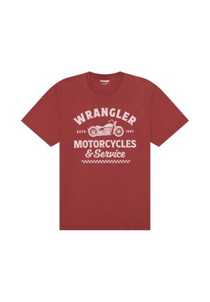 Ruosteenvärinen lyhythihainen T-paita, jossa teksti "Wrangler Motorcycles & Service ESTD 1947" ja valkoinen vintage-moottoripyöräkuva edessä.