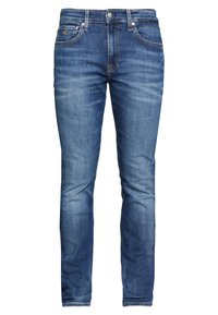Blaue Denim-Jeans, schlanke Passform, ausgewaschene Optik, Fünf-Taschen-Stil, goldene Nähte, Metallknopfverschluss und Gürtelschlaufen.