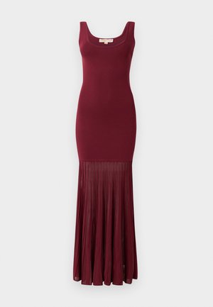 Burgundy gown with a fitted bodice and flared pleated skirt. Smooth texture on top transitions to flowing pleats at the hem.