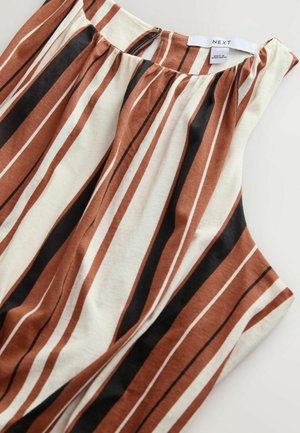 Top senza maniche a righe con linee verticali in marrone, crema e nero. Realizzato in tessuto morbido con una leggera texture e con zip sul retro.
