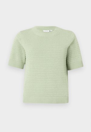 Pull en tricot à manches courtes de couleur vert clair avec un motif texturé. Il présente un col rond ainsi que des poignets et un ourlet côtelés. Matière douce et respirante.