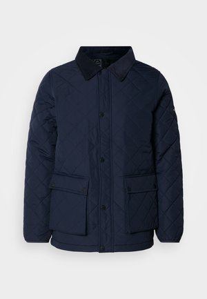 Merineidist kootud jakk, millel on korgitasku krae, nupule klappimise sulgemine ja kaks esikot, valmistatud pehmest ja tekstuurilisest kangast.