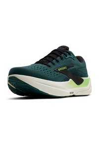 Teal bežecká obuv s vrchom z textilu, čiernymi akcentmi a bielou podrážkou. Obsahuje zakrivenú podrážku, perforácie pre priedušnosť a detaily s logom.