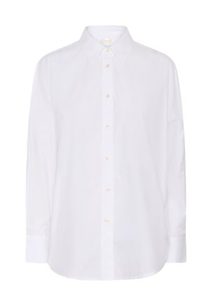 Witte blouse met lange mouwen en knopen, voorzien van een spitse kraag en zeven knopen aan de voorkant, tentoongesteld tegen een effen achtergrond.