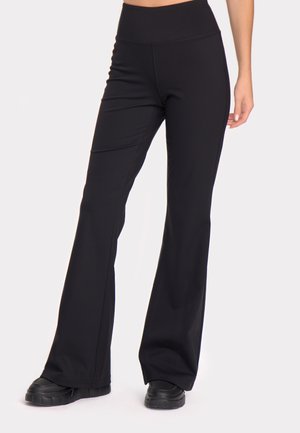PILATES FLARE - Leggingek - Nadrágok - black