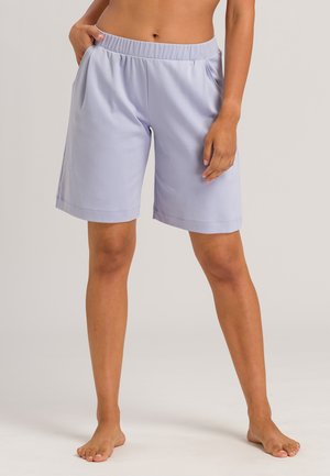Light lavender athletic shorts with an elastic waistband and side pockets, featuring a smooth texture and a knee-length design.