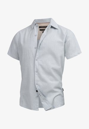 Lichtblauw shirt met korte mouwen in een gestructureerde stof, met een knoopsluiting aan de voorkant, een puntige kraag en een klein logolabel aan de linkerkant.