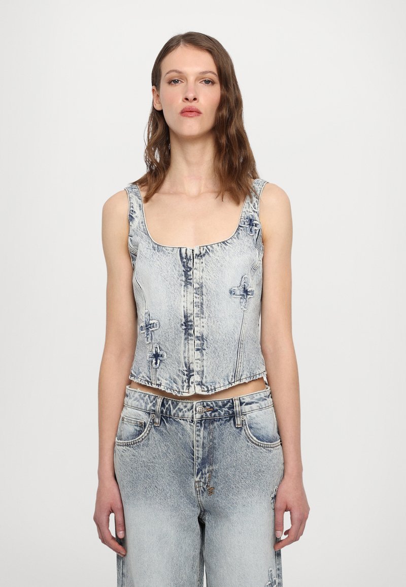 Denim cropped top with a square neckline, light blue wash, front button closure, and lightly textured fabric. No patterns or embellishments.