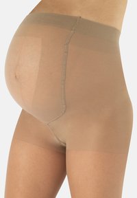 Collant per maternità trasparenti di colore beige chiaro, con vita elastica e texture liscia, progettati per il comfort durante la gravidanza.