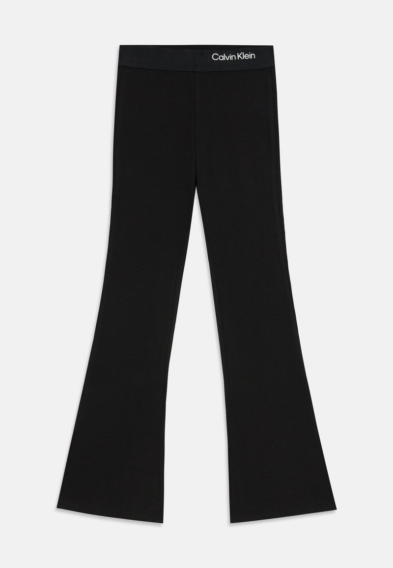 Pantalons évasés noirs en tissu côtelé avec une taille logotée. Le design comprend un haut ajusté et un bas évasé.