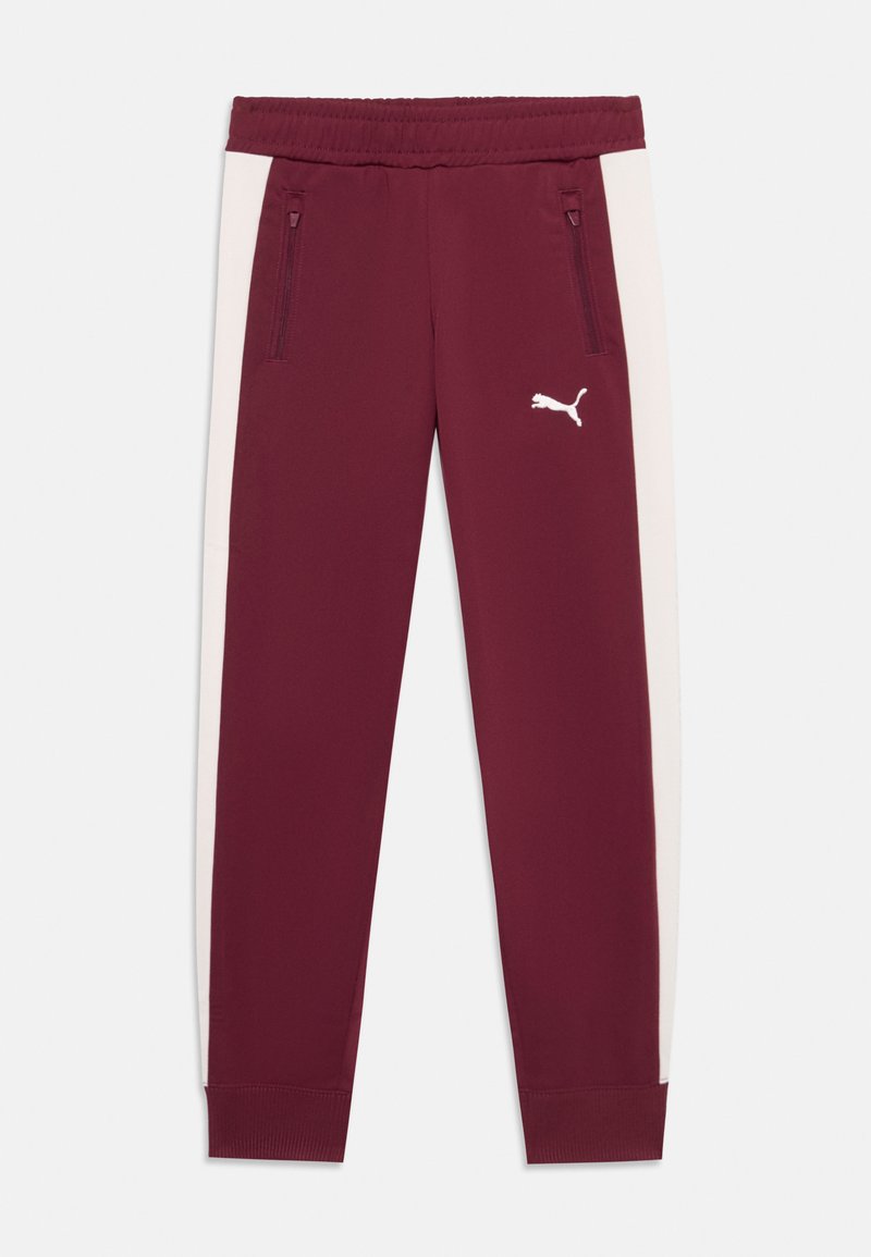Bordeaux joggings met een witte zijpaneel, elastische tailleband, twee met rits gesloten zakken, en een klein wit logo op de linker bovenbeen.