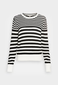Czarny i biały sweter w paski wykonany z dzianiny, z okrągłym dekoltem oraz ściągaczami przy mankietach i dołku. Długie rękawy w luźnym kroju.