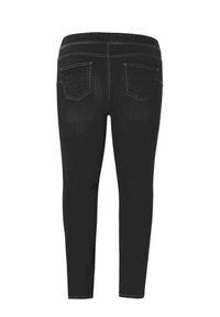 Zwarte denim legging met een elastische tailleband, strakke pasvorm en twee achterzakken. Bevat subtiele stikdetails en een gladde textuur.