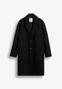 Lang sort frakke med notched revers, to forlommer og to synlige knapper, vist mod en hvid baggrund.