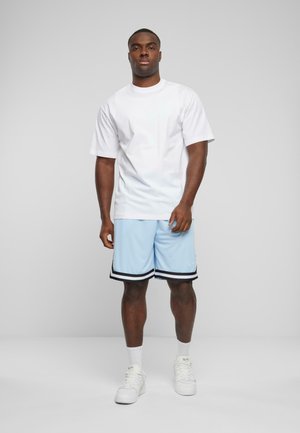 Karl Kani, SMALL SIGNATURE ESSENTIAL  - Pantalon de survêtement - light blue