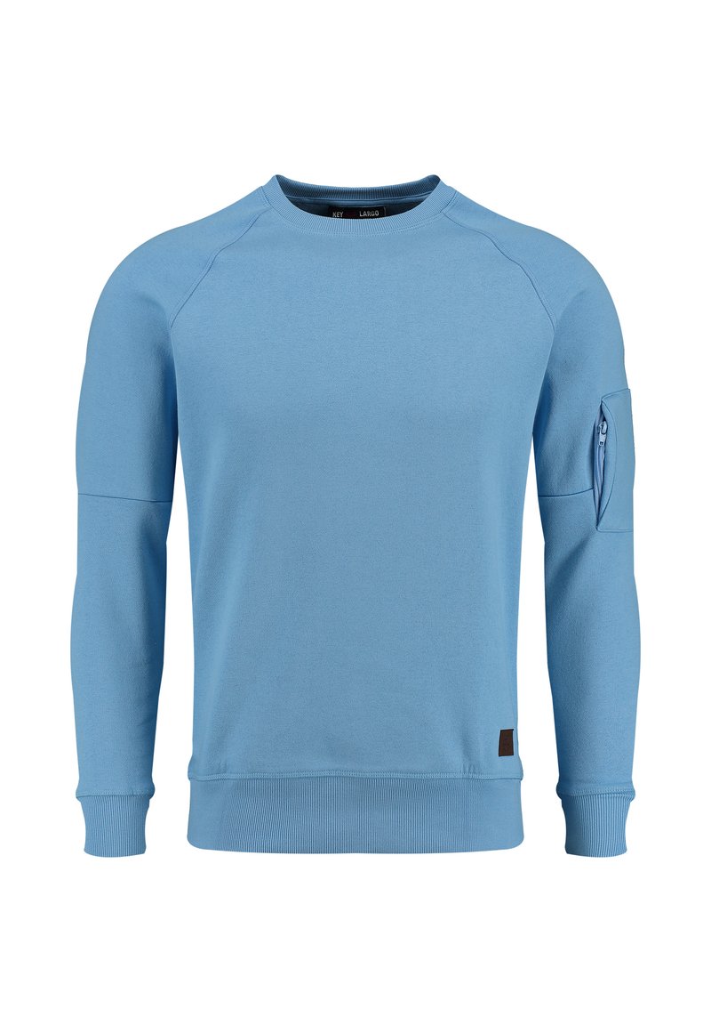 Sudadera de color azul claro con mangas largas, cuello redondo acanalado y un bolsillo con cremallera en la manga izquierda. Tejido suave con una textura lisa.