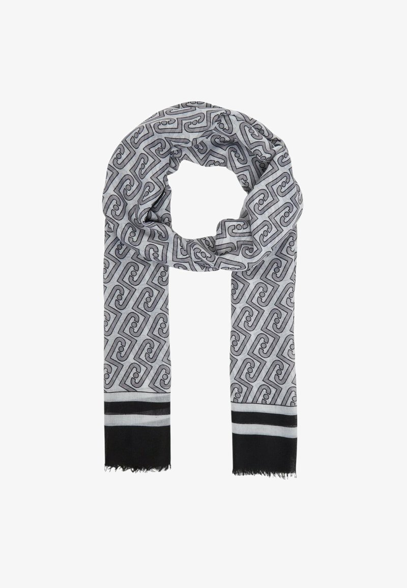 Écharpe grise avec un motif tourbillon géométrique noir et des extrémités rayées noir et gris clair, bordée de franges.