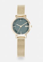 Montre Bracelet Femme DKNY Dorée - Occasion, Parfaite Pour Un Look Chic Quotidien