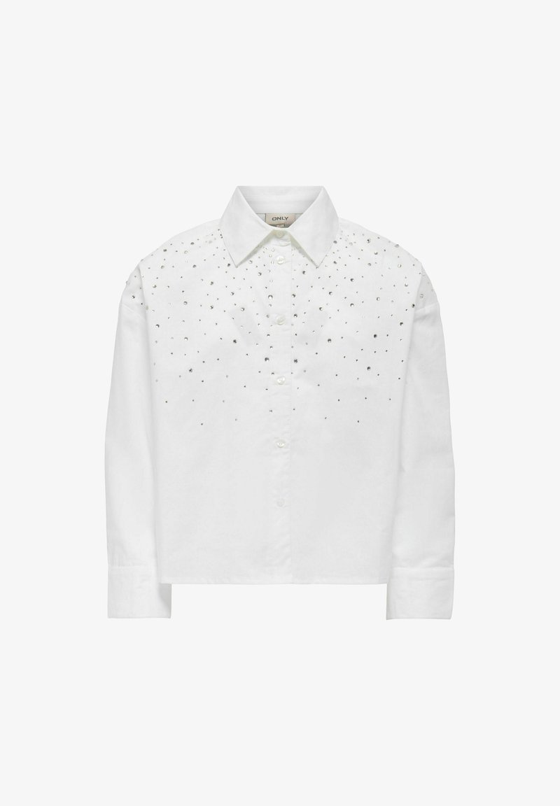 Balta kokvilnas krekls ar apkakles kaklu, kas rotāts ar sudraba kniedēm plecu un augšdaļas priekšpusē. Garas piedurknes ar pogājamiem aproču galiem.