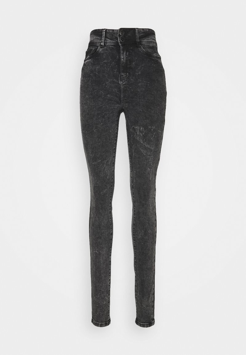 Jeans skinny de tiro alto en negro con efecto acid-wash, con cierre de botones y bolsillos frontales, exhibidos sobre un fondo blanco liso.