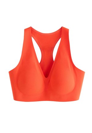 Sømløs, lyseorange racerback sportstoph med formstøbte kopper og brede skulderstropper til medium støtte.