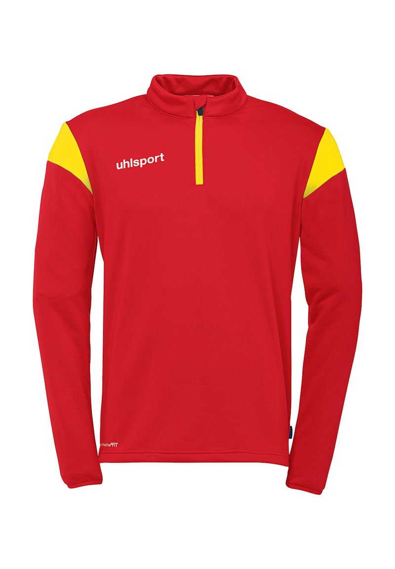 Rød langærmet pullover med halvlukket lynlås, gule skulderaccenter og "uhlsport" logo på brystet, lavet af glat, letvægtsstof.