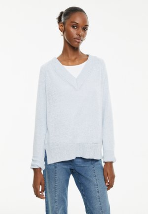 - Sweter