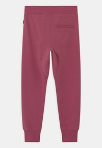 Molo ASHLEY - Tracksuit bottoms - wildrose