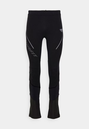 Mustat urheilutrikoot, joissa on tiukka muotoilu, heijastavat yksityiskohdat, kontrastiväriset tekstuuripaneelit ja logo vasemmassa reidessä.