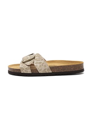Slide sandal with a cork footbed, black sole, beige animal-print strap, and a large adjustable buckle on the top.