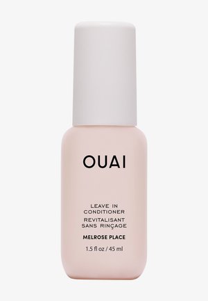 Petit flacon rose de démêlant sans rinçage OUAI Melrose Place avec bouchon blanc, taille 45 ml, présenté sur fond blanc.