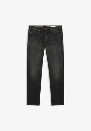 Tummanharmaat farkut, joissa on suora lahkesuunnittelu, viisi taskua, hillitty viiruviimeistely sekä ommellut yksityiskohdat vyötäröllä ja taskuissa.