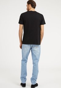 Guess SLIM FIT - Karcsúsított farmerek - blau
