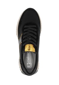 Black sneaker with gold accents, textile upper, rubber sole, and lace-up design. Features a padded collar and logo on the tongue.