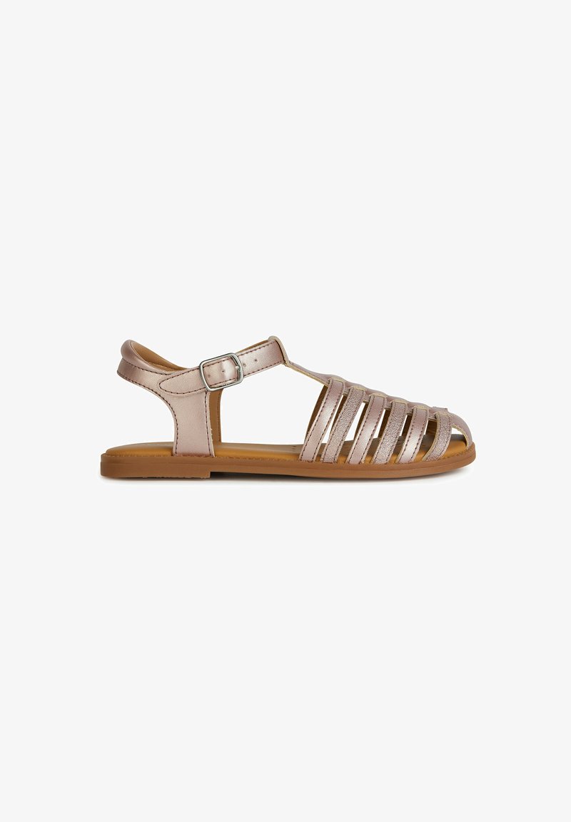 Metallic rose gold sandals with multiple straps and an open toe design. Features adjustable buckle and flat tan sole. Smooth texture.