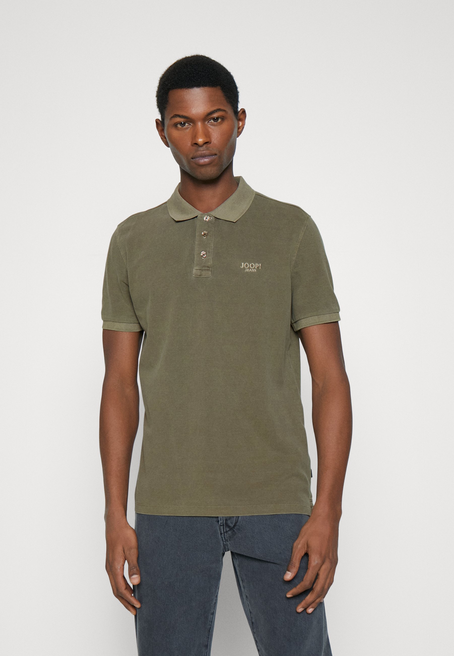brown and green polo shirt