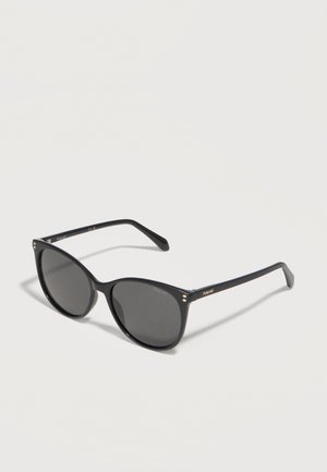 Black Polaroid sunglasses with rounded square frames and dark polarized lenses on a light gray surface.