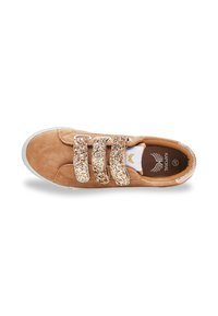 Tan suede sneaker featuring three glittery velcro straps, a white rubber sole, and a logo on the insole. Smooth texture overall.