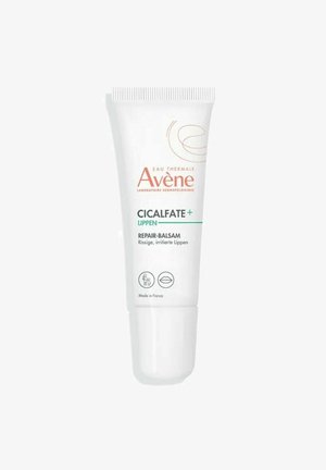 Avene CICALFATE+ lip balm in a white plastic tube with a screw cap, featuring orange and green text. Made in France, skin care product.