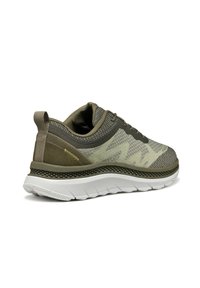 Olive green athletic shoes with a mesh upper, white sole, textured accents, and a pull tab at the heel. Features stitching details.