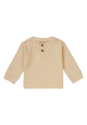 Beige gerippte Langarmbluse mit Rundhalsausschnitt, zwei Holzknöpfen an der Vorderseite und einem gesäumten Saum, aus strukturiertem Stoff gefertigt.