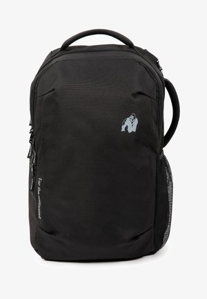 Zwarte rugzak van textuurstof, met een voorvak met rits, een mesh zijvak en een subtiele gorilla-logo. Voorzien van verstevigde handvatten en schouderbanden.